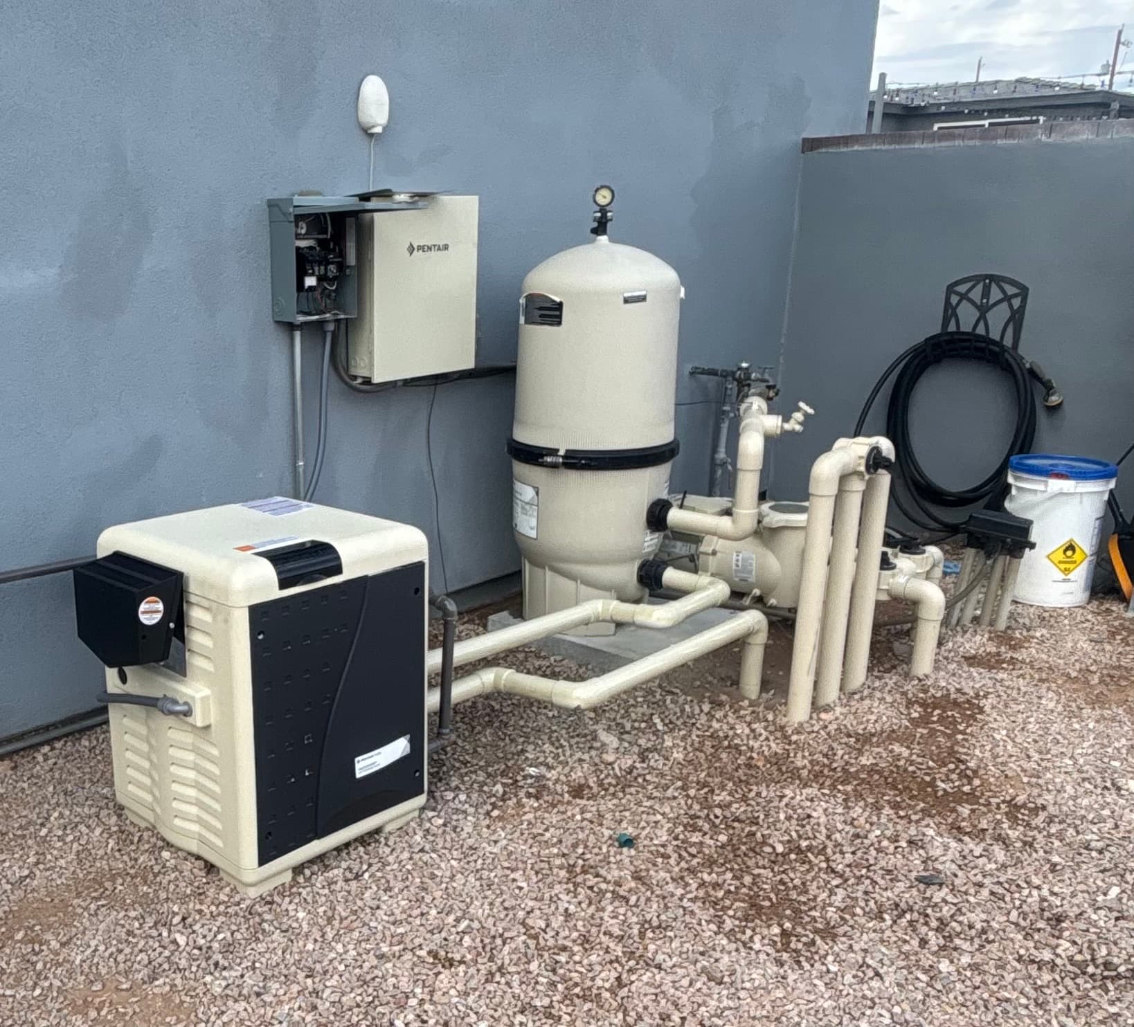 Serviced residential pool equipment pad